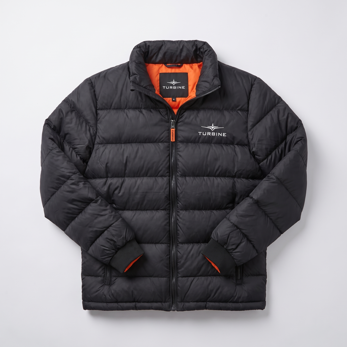 Turbine Altitude Puffer Jacket flat lay showing front zip and orange lining